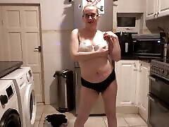 Wife stripping naked in the kitchen