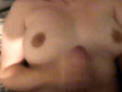 Jerkoff a dick until it cums on my tits