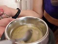 The slave gets to lick her feet before eating by Femdom Austria