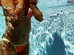 French beauty Anita Rover in the pool