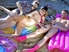 Skinny blonde Evy Sky double penetration at the beach