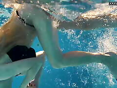 Perfect body blonde teen enjoys naked swimming