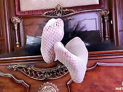 The sex tanjin tisha in white fishnet tights foot teasing on the bed