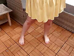 Sexy Wife in Yellow Miniskirt and Bikini wran tan with Big Boobs