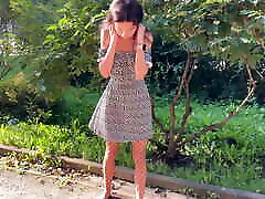 Public masturbation - Girl touches pussy with a plug in her ass and pees on the street