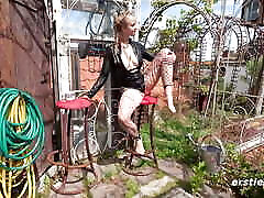 Ersties - Highlight with latex bodysuit and fishnet tights in garden idyll