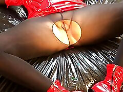 Red fetish dress, black pantyhose, ankle japan kednep and dildo