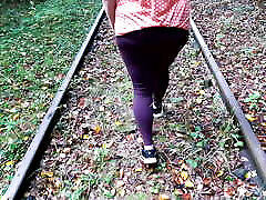Beating her tits on railway
