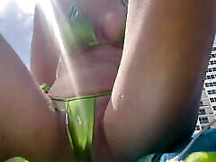 Italian Big Tits At the Beach in Florida wearing a Micro Bikini flashing her horny wet pussy and putting sunscreen on her body