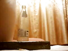 Expanding anal with a big bottle of small ass