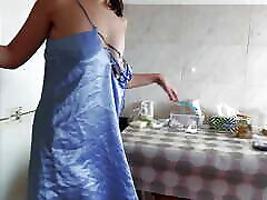 Sexy brunette naked in the kitchen. The amateur housekeeper gives the vacuum cleaner naked.