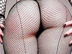 PAWG in sexy fishnets spanked herself and enjoyed riding a hard dildo