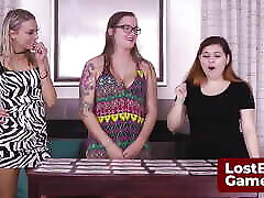 Three horny friends play a naughty lesbian strip game together