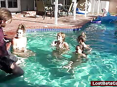 Lucky guy enjoys all four of his friends in the swimming pool