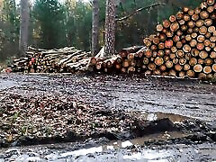 Naked plump boobs banging on wood pile