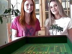 A cute redhead and a blonde learn a new.strip craps game
