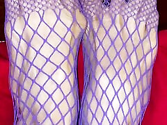 Really sexy legs with tiny feet with long toes in Purple fishnet stocking