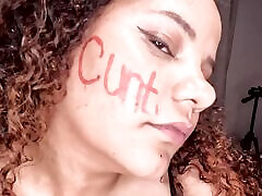 BBW colored girl DEEPTHROATING A dildo after writing dirty words on her whore face