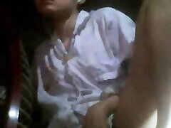The camera under the table captured a beautiful woman at home alone and watching a porn movie.