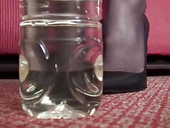 Beautiful milf pissed in hinde 69ww bottle and sprays her slave