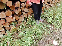 Slapping her tits in nature