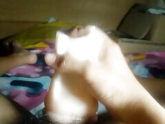 Young Asian first time using a toy