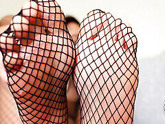 Drooling foot bitch for fishnet feet
