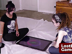 Stefanie and SarahBeth playing Spin the Bottle, electronic style