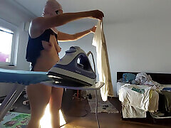 Amateur mom does housework naked.