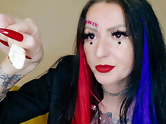 Food fetish. Dominatrix chews gummies. Teeth fetish, chewing fetish
