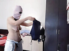 Amateur wife enjoys trying on clothes and cutting them. Amateur wife dances naked in the house.