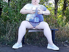 a friend in the park undresses and masturbates to orgasm on a bench