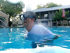 Couple Underwater Diving and Swimming