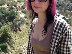 Pink haired whorable chick in sunglasses flashes her pale titties on the road