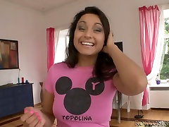 Appealing babe with pretty face is getting fingered in her ass