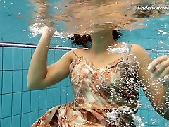Skinny teen swimming naked in a pool in ariel rose7 video