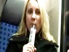 Masturbation with dildo and butt plug in a train
