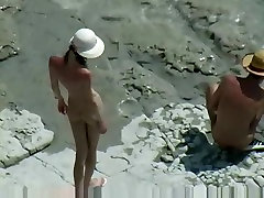 Bare beachgoers caught fucking on cam