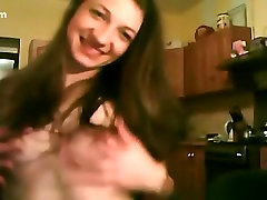 Cute brunette girl teases, rides a dildo, sucks her bf and doggystyle fucks him on cam.