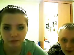 Ponytailed girl sets up the webcam and makes her first sextape