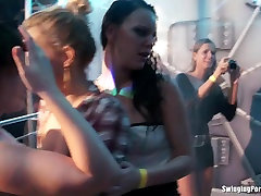 Slutty girls dancing erotically in a club