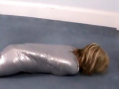 Girl wrapped in brandi love full length movie tape like a mummy