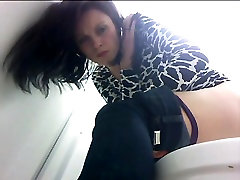 A black haired my father girlfriend japanese lady realizes that a voyeur is filming her during pissing