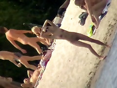 Beach porno baezzers 2017 of a white skinny fit nude bitch in sunglasses