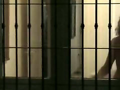 Blonde lady with naked natural boobs in the voyeur thru tap sane clip