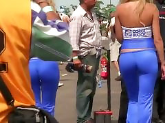 Sexy models get recorded by a candid cam on a racing track