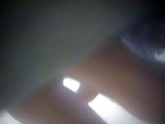 A girl wearing white skirt lets everybody have a great upskirt view in the ugly hairy girl tube room