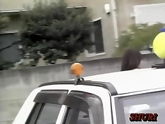 Hot Asian got top sharked between the two cars on the lot
