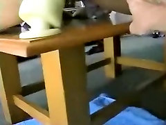 Masked chick rides a giant marital-device in her pooper
