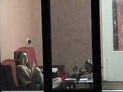 Real window voyeurism of the pretty teen alone and topless